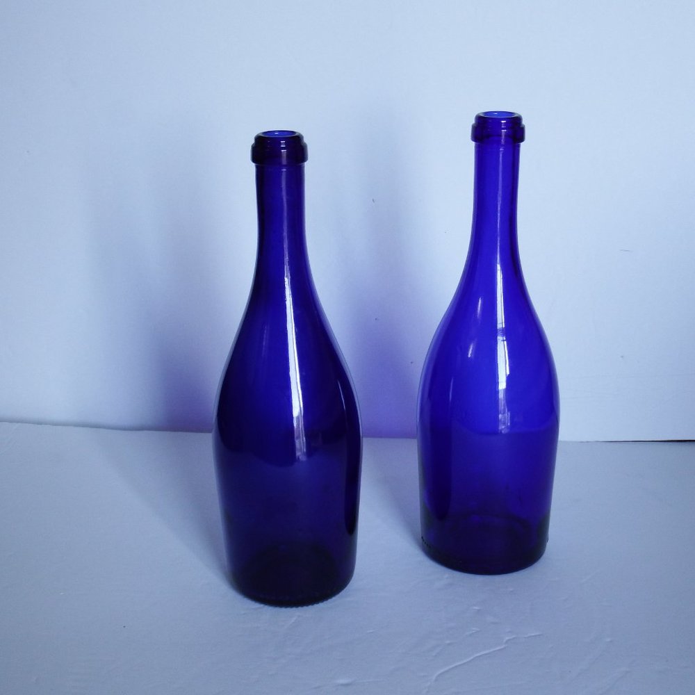 A Set of Two Blue Cobalt Wine Bottles 11.5" H